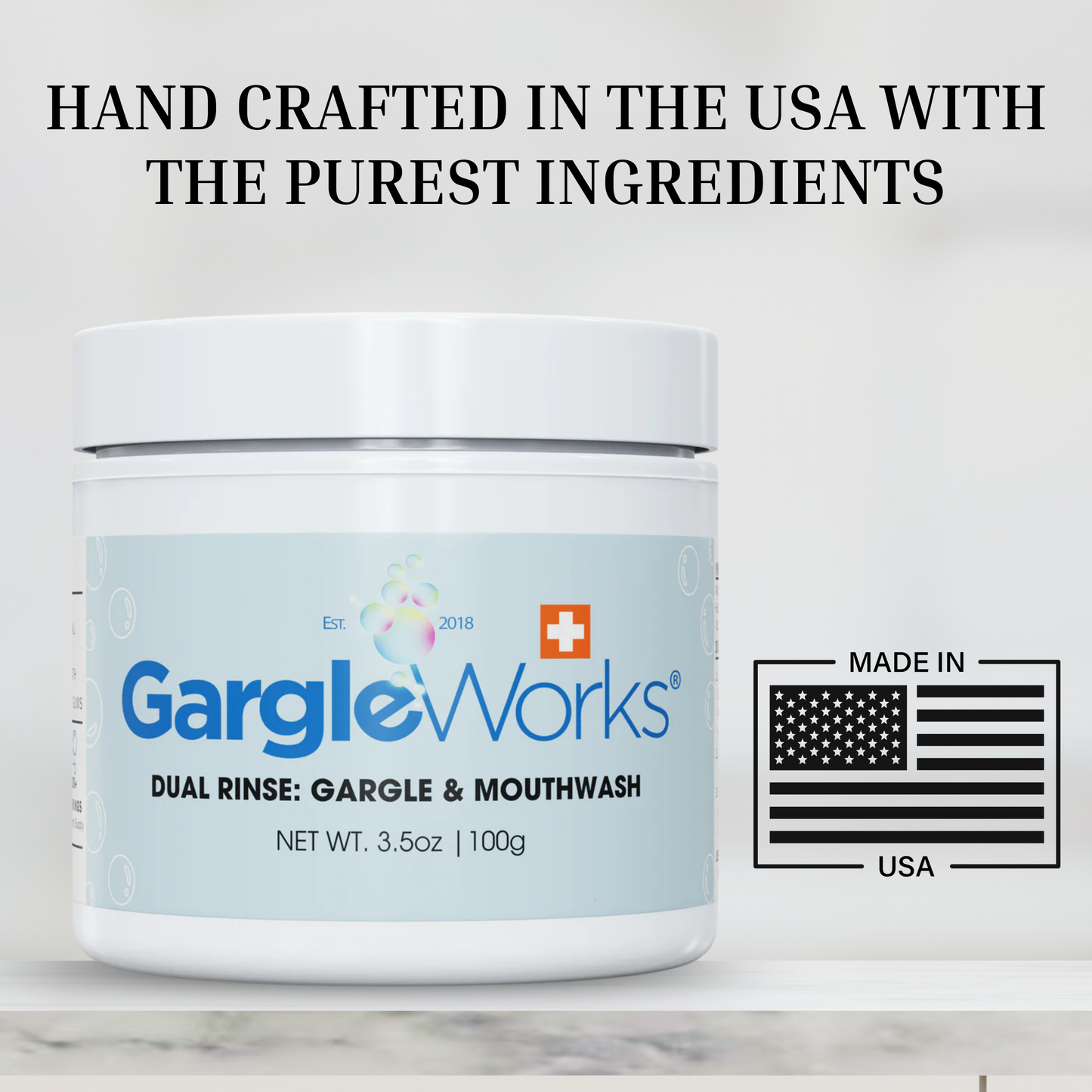 Close-up of GargleWorks jar with text: 'HAND CRAFTED IN THE USA WITH THE PUREST INGREDIENTS'. U.S. flag icon with 'USA' label appears beside the jar.